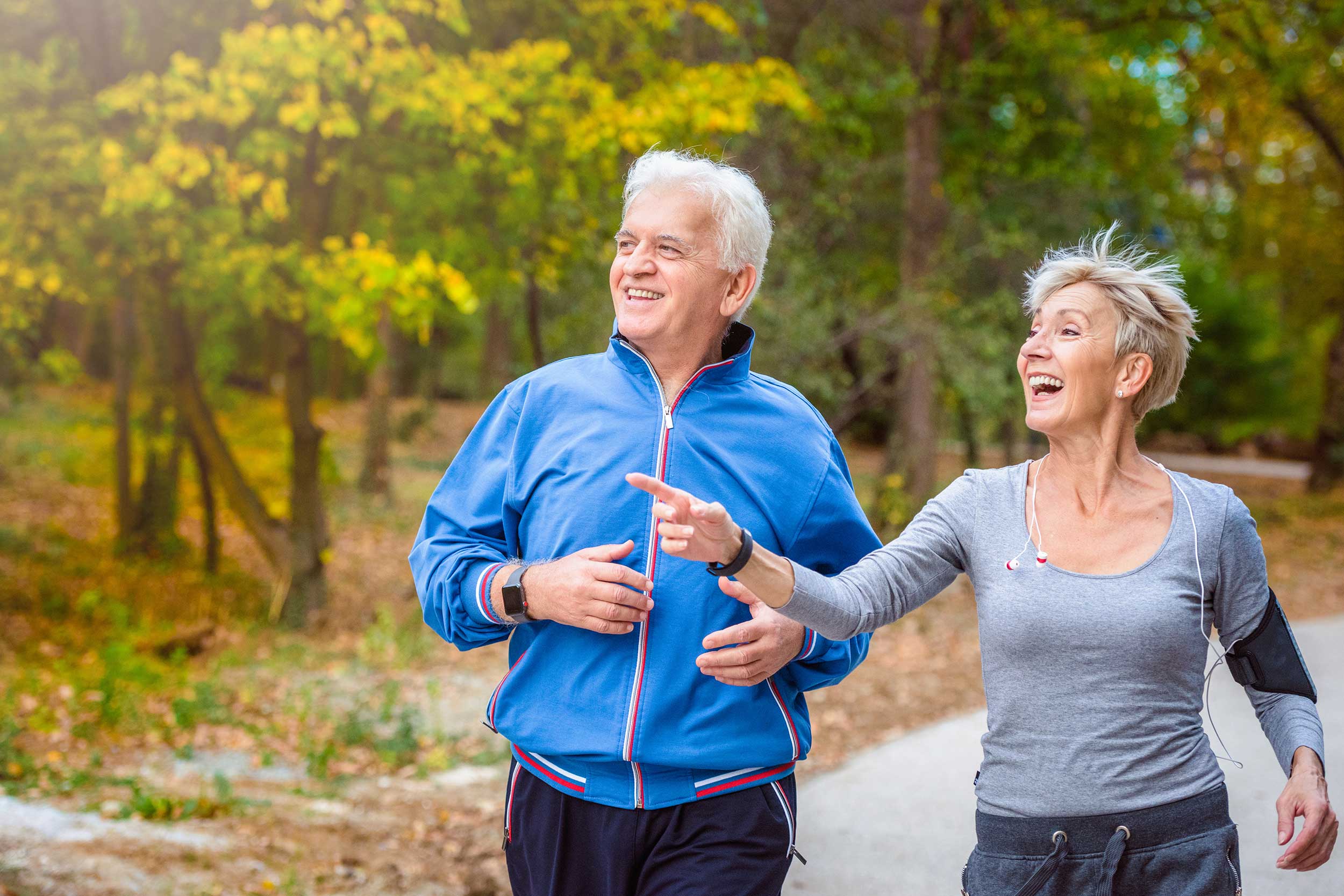 senior couple running